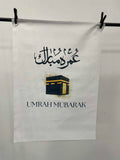 Umrah Mubarak banner with Arabic and English Text includes 8 Balloons